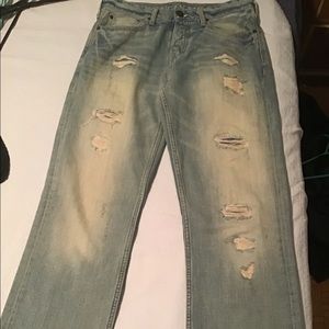 American eagle bootcut jeans ripped style , waist 32, length 36